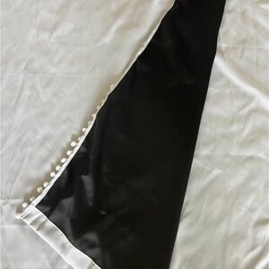 Black out curtains, white with Pom Poms